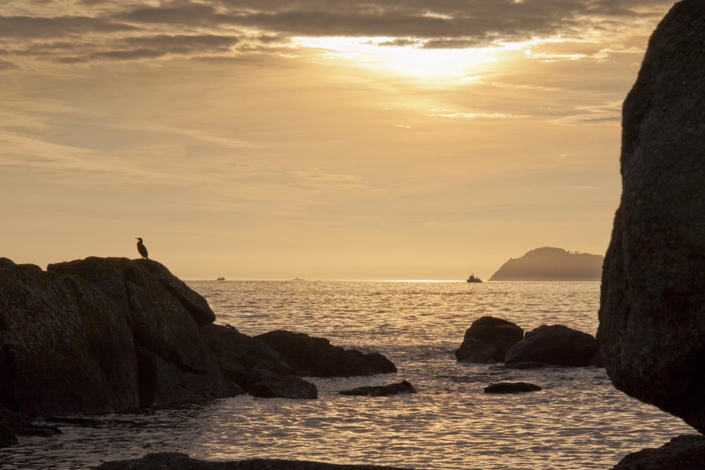 Puesta de sol en la playa de Samil